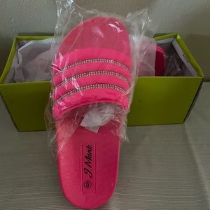 A pair of platform beach Sandals